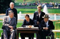 President George H.W. Bush signs into law the ADA