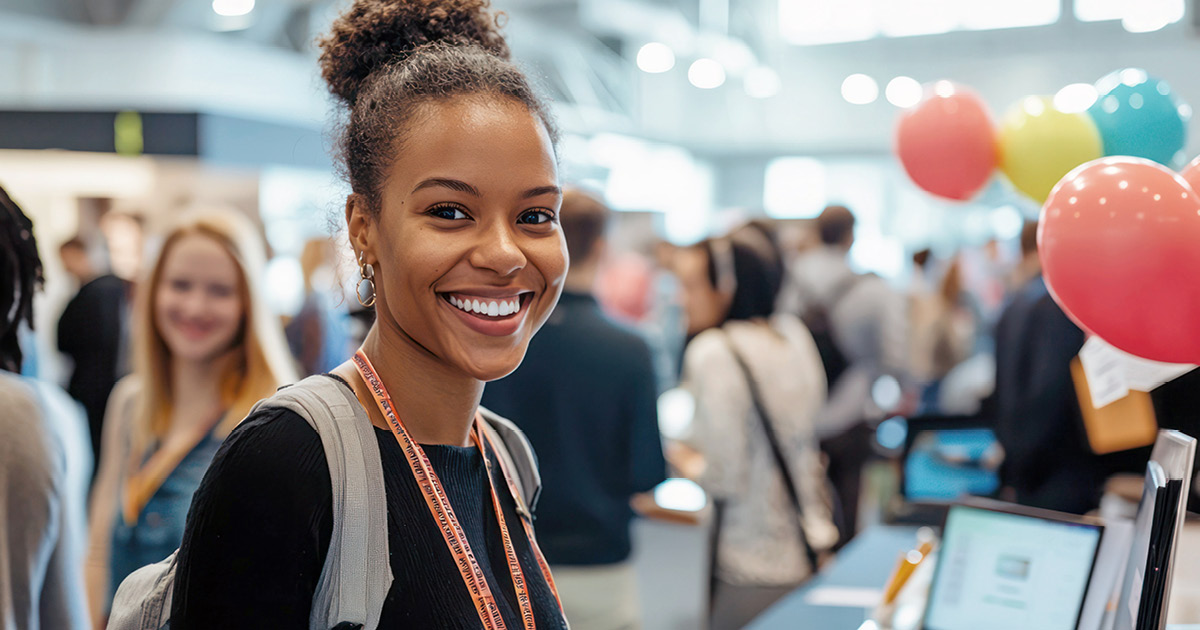 A person attending a career fair. 