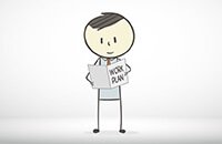 Ben holding a work plan