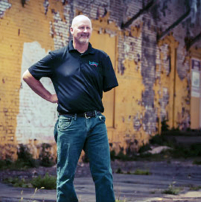 Photo of Marty standing Photo of Marty standing