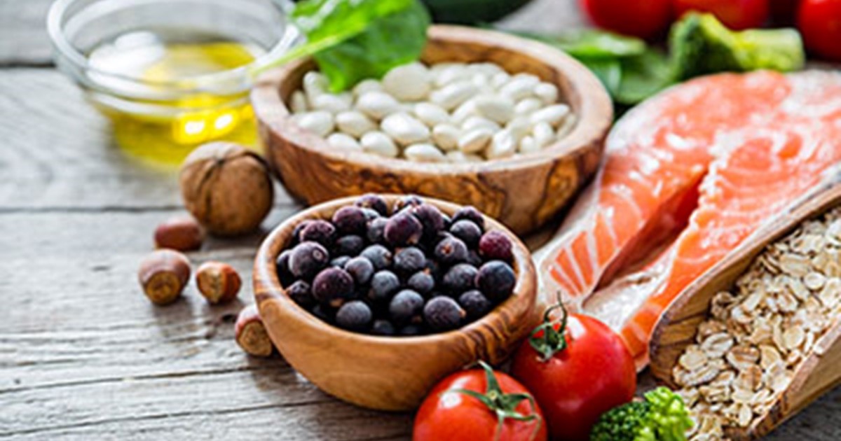 display of uncooked food varieties at a table