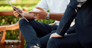 Two people having a meeting in the park. 